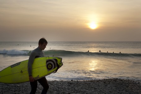 surfer and sunset at Gwithian